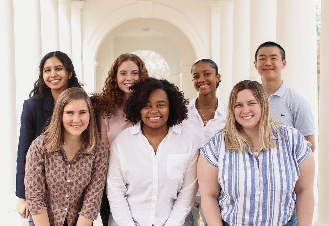 Seven UVA students who produce the Still We Rise podcast in a group photo