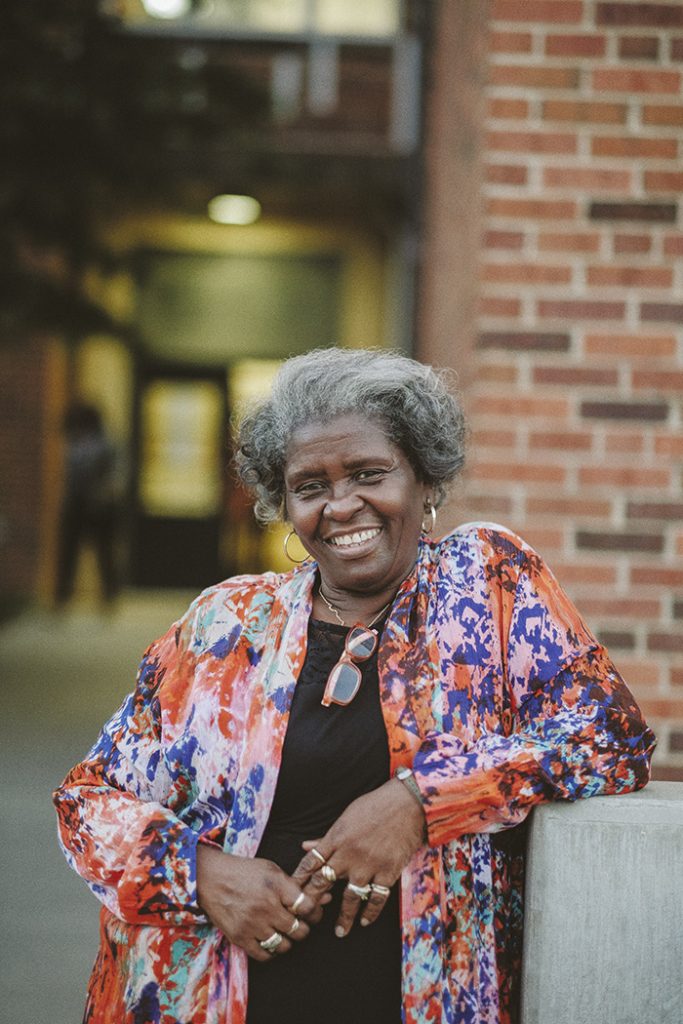 Joy Johnson in a floral jacket and black shirt