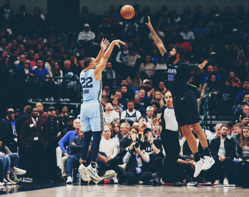 Desmond Bane shoots the ball over Derrick Jones Jr.