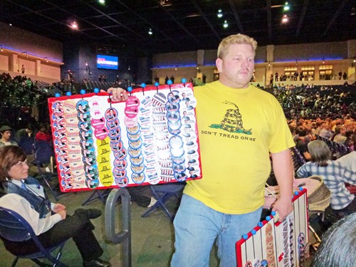 A button-vendor worked the crowd for Santorum art Belmont University in Nashville Wednesday night.