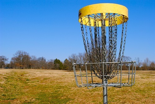 A disc golf basket at Shelby Farms Park.