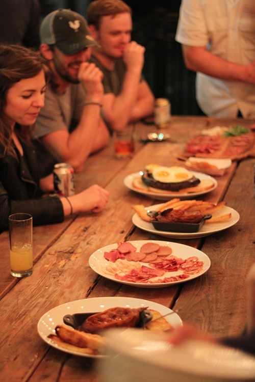 After the Friends of Beard Dinner, chefs enjoy a late-night dinner on Hog & Hominys back patio.