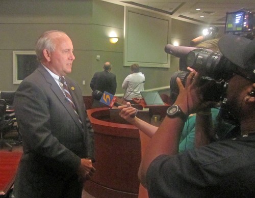 Collierville Mayor Stan Joyner with press after vote