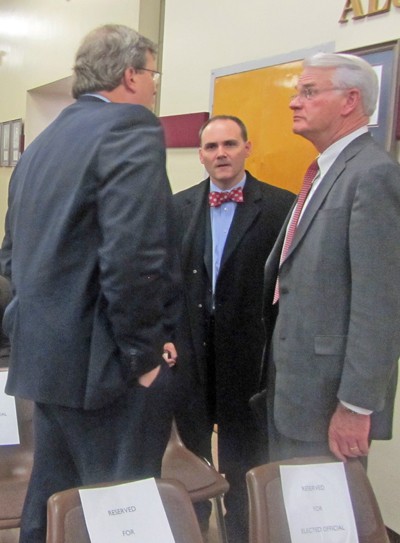 Councilman Jim Strickland, County Commissiner Mike Carpenter, and County Mayor Mark Luttrell huddle before the summit. Councilman Jim Strickland, County Commissiner Mike Carpenter, and County Mayor Mark Luttrell huddle before the summit.