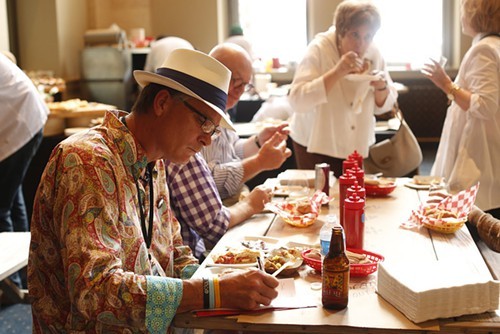 Craig Blondis of Central BBQ sits down to sample a judges plate.