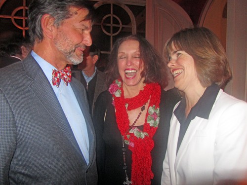 District Attorney General Amy Weirich (right) and hostess Pat Kerr Tigrett respond to jest by guest Rick Masson at Weirich fundraiser this week.