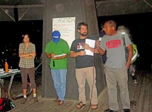 Jacob Flowers and Brad Watkins consult with other Occupy Memphis organizers before groups plenary session at Overton Park gazebo.