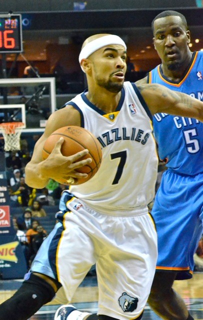 Jerryd Bayless, shown here driving past Kendrick Perma-Mad Perkins, is officially a Celtic.