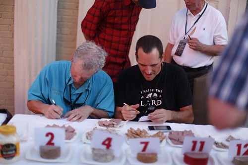 Judges scoring the bologna.