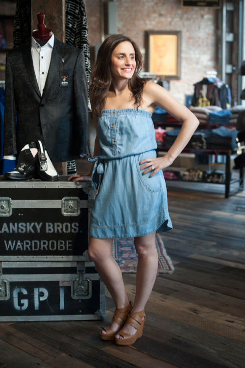 Julie wears a dress and shoes from Lansky 126.