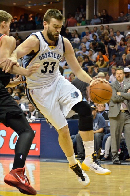 Marc Gasol drives past a guy with two last names.