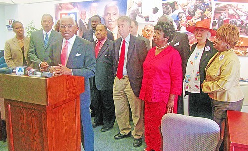 Mayor Wharton with some of the officials endorsing him. Note the interloper whose head appears between Shelby County Commissioner Steve Mulroy (red tie) and state Rep. Johnnie Turner (red dress). Hint: his name begins wih 'O.'