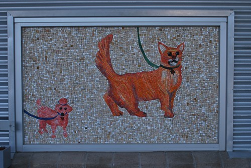 Mosaics outside the building greet visitors