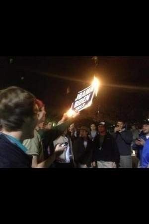 Ole Miss student burns an Obama/Biden lawn sign