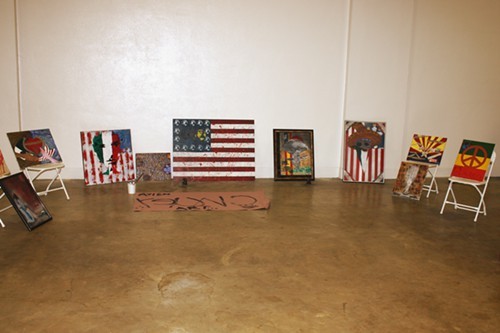 Paintings on display at the People's Conference on Race and Equality