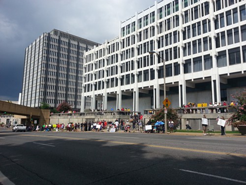 Protesters also gathered behind City Hall facing Front Street.