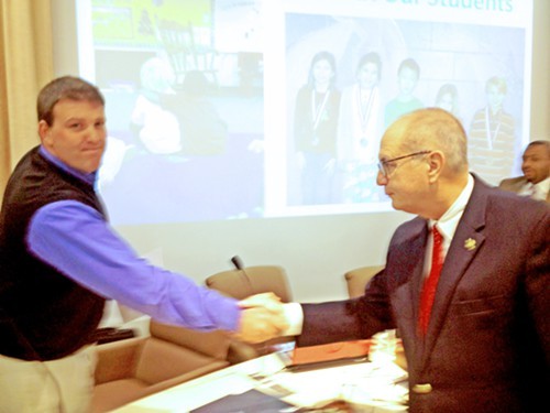 SCS Board meber David Reaves (l) being congratulated by Bartlett Mayor Keith McDonald