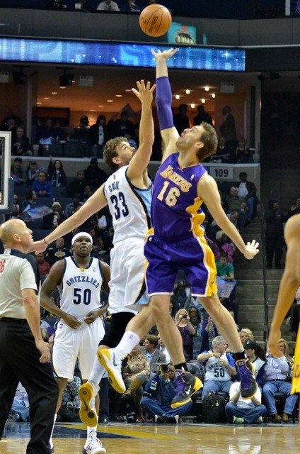 The Gasol brothers jump for it while Z-Bo adjusts his britches.